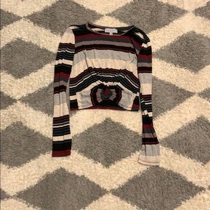 Dark green, red, gray, and black long sleeve top.